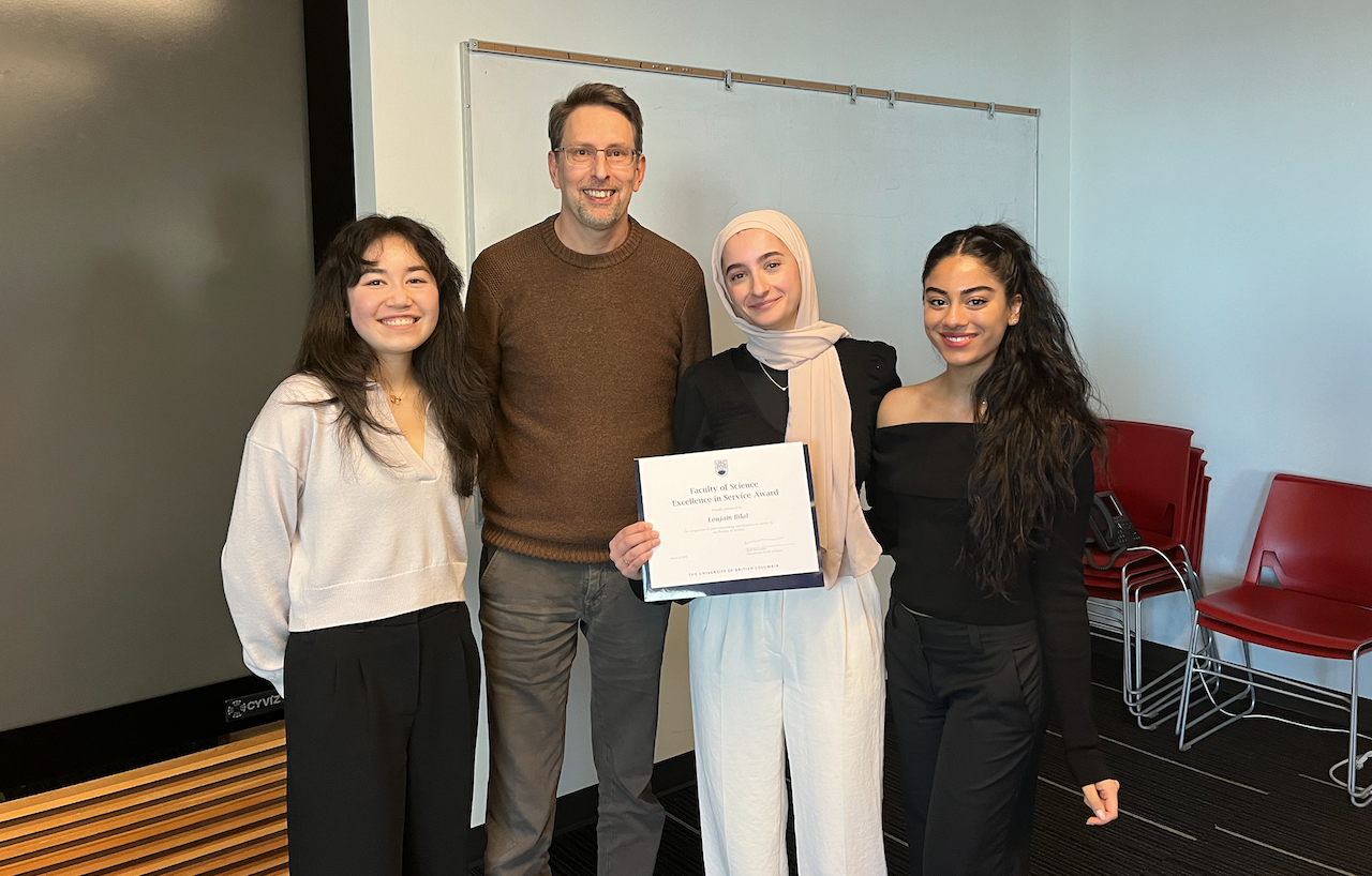 Loujain (holding certificate) with MISA members and MBIM Department Head, Michael Murphy