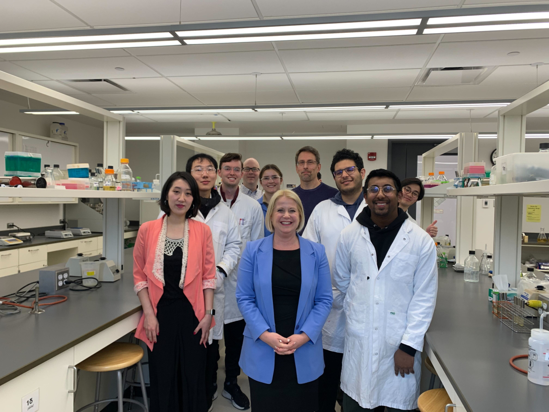 Lisa Beare with people from MBIM in the new lab space 